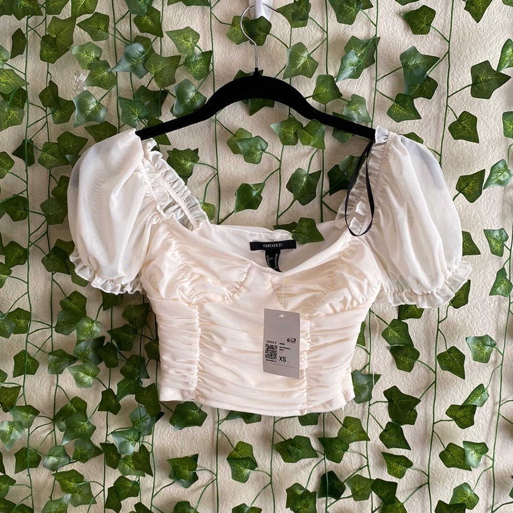 See photos for all details! Brand new- Tags still in. XS. See size guide!